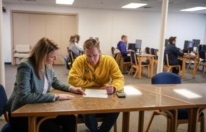 Student reviewing testing procedure with instructor